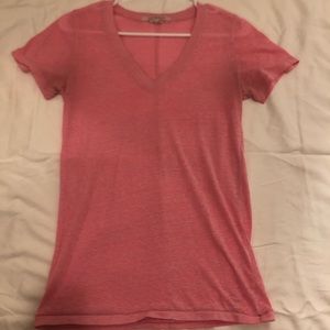 Pink short sleeve top.